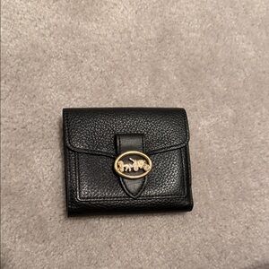 Coach Black Wallet with Gold Emblem
